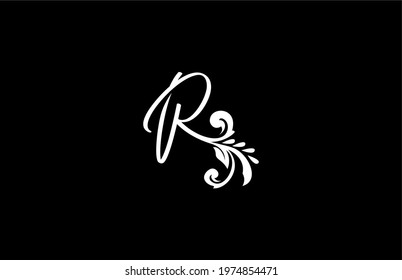 Letter R initial flourishes flower ornament logo