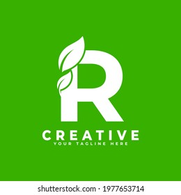 Letter R with Leaf Logo Design Element on Green Background. Usable for Business, Science, Healthcare, Medical and Nature Logos