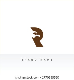 Letter R logo with eagle design element vector illustration. Corporate branding identity