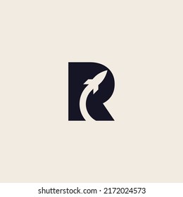 letter R monogram with a flying rocket ship silhouette icon.