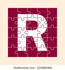 letter R is written on the puzzle pieces