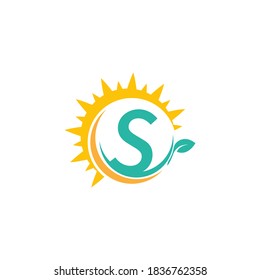Letter S icon logo with leaf combined with sunshine design concept