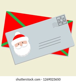 Letter with Santa Claus head on it and envelope