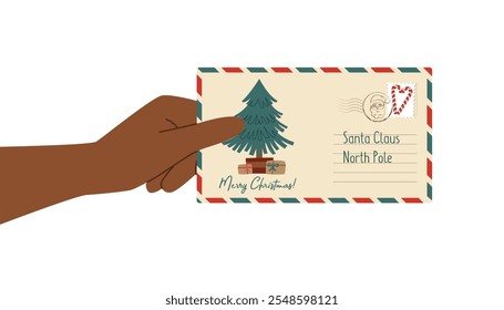 Letter to Santa Claus in human black skin tone hand isolated on white. Christmas letter in envelope. 