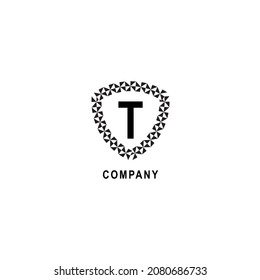 Letter T alphabetic logo deisgn template. Geometric shield sign illustration isolated on white background. Insurance company logo concept.