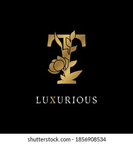 letter T flower leaves decoration for wedding, beauty care logo, personal branding identity, make up artist or any other royal brand and company. luxurious gold and silver color sample in dummy text