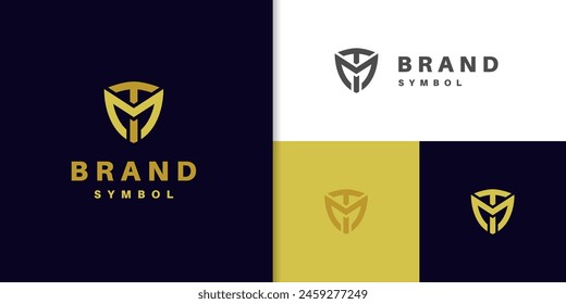 letter TM or MT logo design. shield with logotype icon font monogram elements