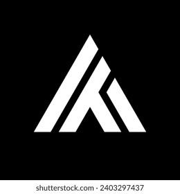 Diseño del logotipo del triángulo de la letra AT