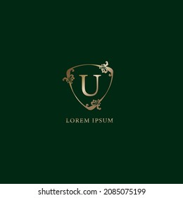 Letter U Alphabetisches Logo Design-Vorlage.  Konzept des Versicherungslogos Luxuriöse, goldene, dekorative Blumenschildkröte einzeln auf dunkelgrünem Hintergrund.