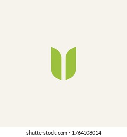 letter U form with leaf icon logo vector design template concept. 