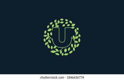Letter U with leaf green garden nature ornament  logo vector icon  design 