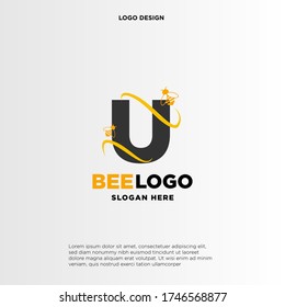 letter U logo and honey bee