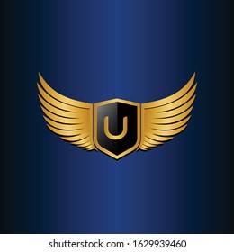letter U shield with wings gold color logo design concept template vector 3d heraldic shield and wings logo gold / silver emblem