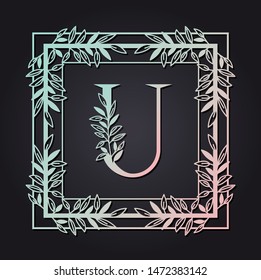 letter U in square frame with leafs