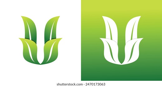 Letter U or V logo design with leaves creative concept. Premium Vector