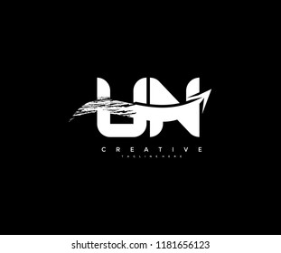 Letter UN with Artistic Bold Grunge Arrow Shape Logo