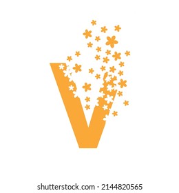 The letter V dissolves into a cloud of flowers.