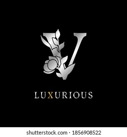 letter V flower leaves decoration for wedding, beauty care logo, personal branding identity, make up artist or any other royal brand and company. luxurious gold and silver color sample in dummy text