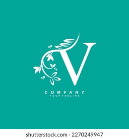 letter V logo design with flowers, leaves and white feathers with a beautiful and elegant style. monogram V. typography V. initial V logo. suitable for beauty, business, spa, salon, wedding, boutique