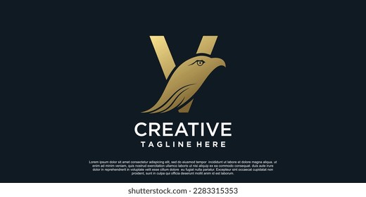 Diseño del logotipo de la carta V con el concepto exclusivo del águila de cabeza Vector Premium