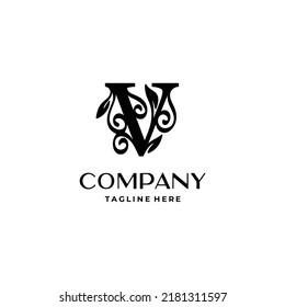monograma de diseño de logotipo de letra v con vector de decoración floreciente