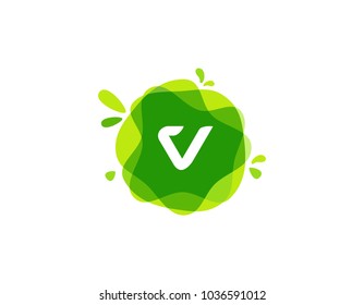 Letter V logo at green watercolor splash background. green nature logo vector