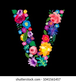 The letter "V" made of flowers on a black background. The letter of the English alphabet. Bright floral print. Great for T-shirts, cards and more.