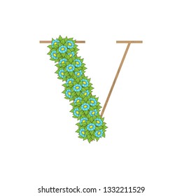 Letter V wooden texture with green leaves and flowers