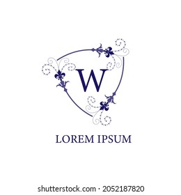 Letter W alphabet initial logo design template. Decorative floral shield with Lily Flower ornament. Isolated on white background. Purple Violet Color Theme.