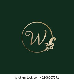 Letter W Decorative Alphabet Logo isolated on green Background. Luxury gold ring Initial Abjad Logo Design Template. Elegant Curl Floral Logo Concept. EPS 10 File Project