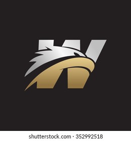 letter W eagle head silver gold logo black background