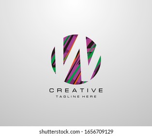 Letter W Logo. Abstract Circle W letter design, made of various geometric shapes in color.