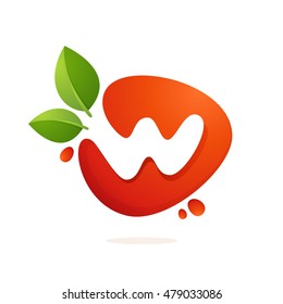 Letter W logo in fresh juice splash with green leaves. Vector elements for natural application, ecology presentation, business card or cafe posters.