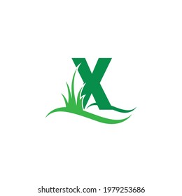 Letter X behind a green grass icon logo design vector template