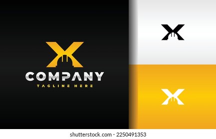 letter X construction helmet logo