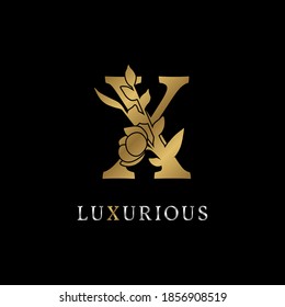 letter X flower leaves decoration for wedding, beauty care logo, personal branding identity, make up artist or any other royal brand and company. luxurious gold and silver color sample in dummy text