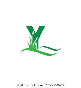 Letter Y behind a green grass icon logo design vector template