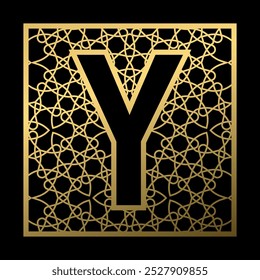 Letter Y is carved in vintage patterned square on black background. Golden monogram in vintage style.