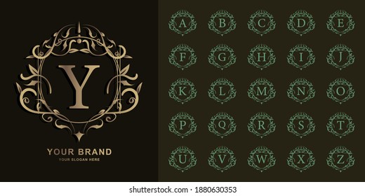 Letra Y o colección alfabeto inicial con una plantilla de logotipo dorado de marco floral adornado de lujo.