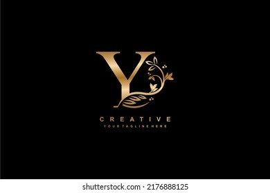 letter Y logo design with flowers, leaves and golden feathers in a beautiful and elegant style. monogram Y. typography Y. initial Y logo. suitable for, business, wedding, boutique, company, hotel, etc