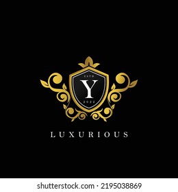 Letter Y logo with Luxury Gold Shield. Elegance logo vector template