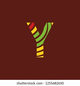 Letter Y logo on dark background with bright colors, African culture, safari decoration
