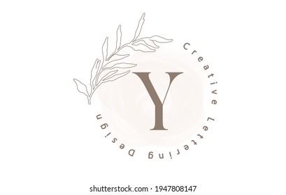 Letter Y Logo With Watercolor brush and circle lettering design and outline leaves in Pastel Colors. Creative vector illustration with letter Y for beauty, fashion, natural products or eco services.