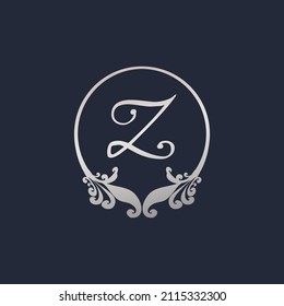 Letter Z Decorative Crown Ring Alphabet Logo isolated on Navy Blue Background. Luxury Silver Initial Abjad Logo Design Template. Elegant Curl Floral Logo Concept. EPS 10 File Project