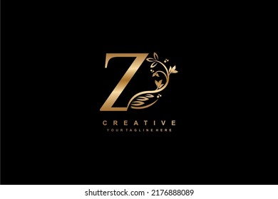 letter Z logo design with flowers, leaves and golden feathers in a beautiful and elegant style. monogram Z. typography Z. initial Z logo. suitable for, business, wedding, boutique, company, hotel, etc