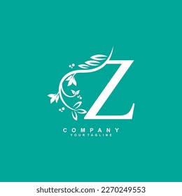 letter Z logo design with flowers, leaves and white feathers with a beautiful and elegant style. monogram Z.typography Z. initial Z logo. suitable for beauty, business, spa, salon, wedding, boutique