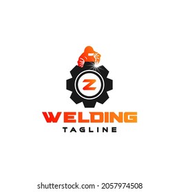 Letter Z welding logo, welder silhouette working with weld helmet in simple and modern design style