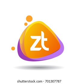 Letter ZT logo in triangle splash and colorful background.
