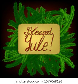 lettering blessed yule, decorated with green pine-tree branches