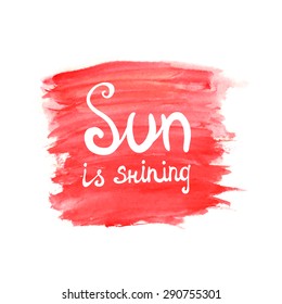 Lettering calligraphic phrase SUN IS SHINING on orange watercolor background